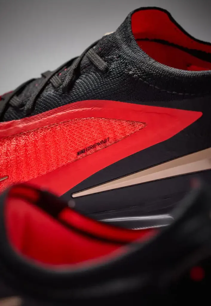 Black and crimson Nike Phantom 6 Elite football boot.