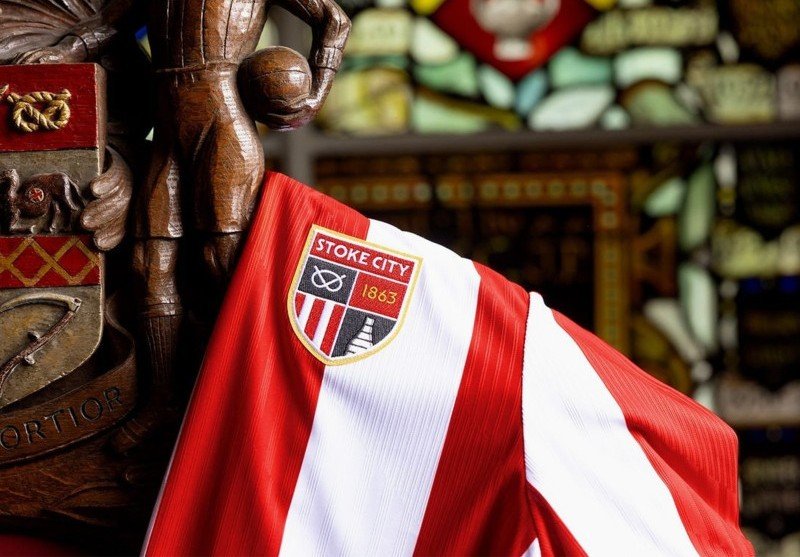 Stoke City 2026/27 home kit showing the new crest featuring the bottle kiln and Stafford knot.