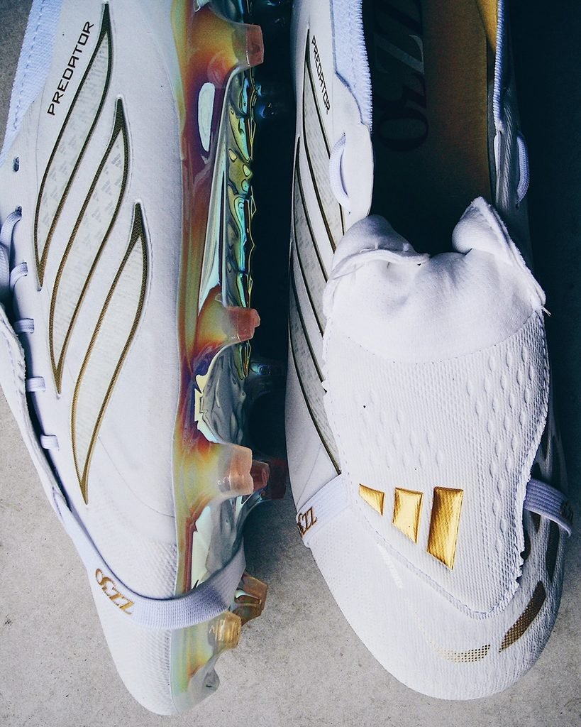 The liquid gold chrome Controlframe split outsole of the Zidane Predator boot.