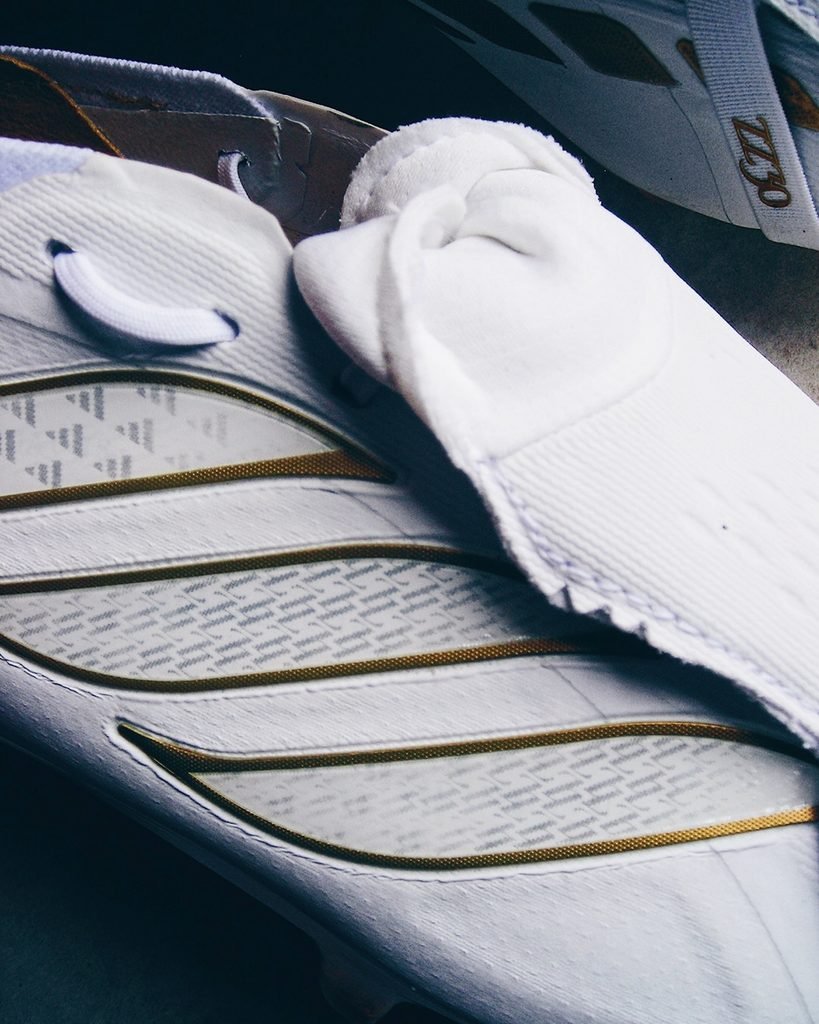 The white and gold Adidas Predator Zidane 30th Anniversary football boots